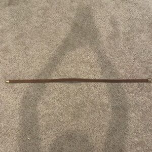 I’m selling a black and brown belt size medium.